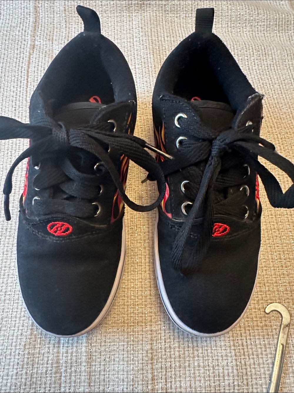 Heelys Black Sneakers with Red and Yellow Flame Accents